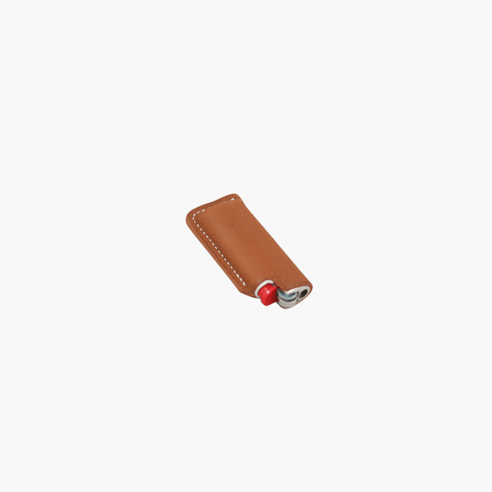 LIGHTER SLEEVE GOLD LAPERRUQUE - détail cuir