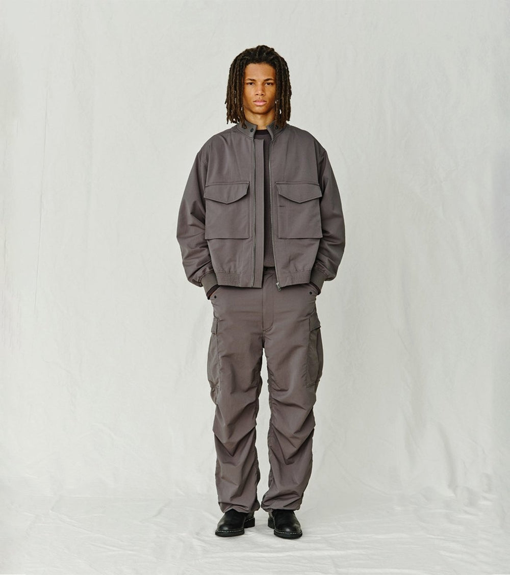 ALPHADRY FIELD JACKET - Charcoal NANAMICA - silhouette complete portee