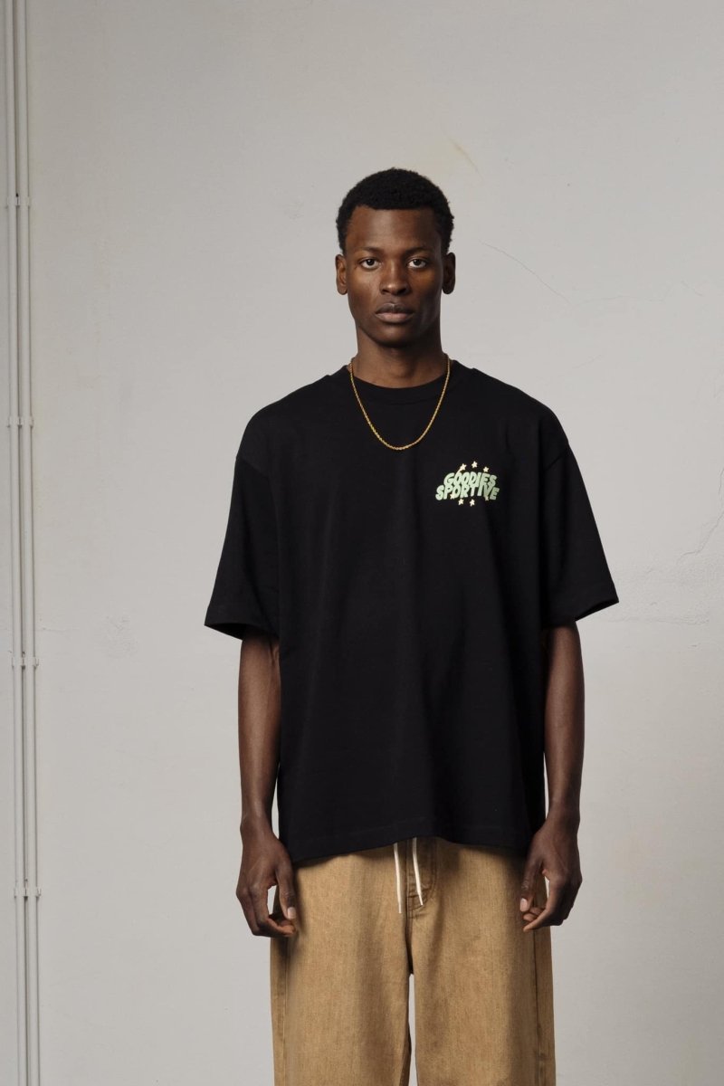 ROOTS OF AFRICA TEE - Black GOODIES SPORTIVE - porté vue rapprochée