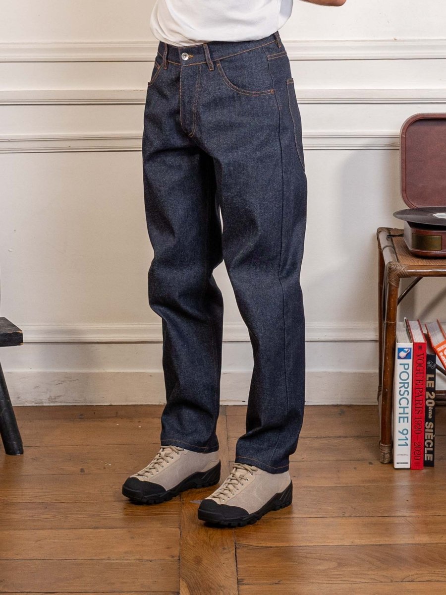 YMC Bez Jeans in raw indigo, worn, three-quarter view