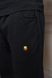 détail broderie pot de miel retravaillée hdv pantalon noir