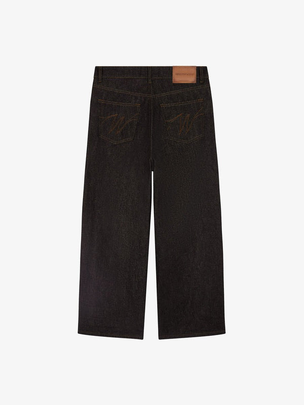 Le pantalon baggy en denim brut